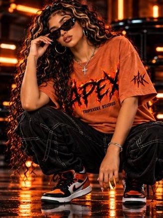 APEX orange shirt, crouched view